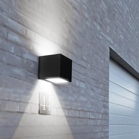 SOTTLOT solar wall light with up and down beams brightens porches