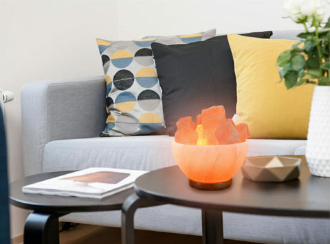 Spantik lamp on a desk or shelf showcases compact, elegant placement.