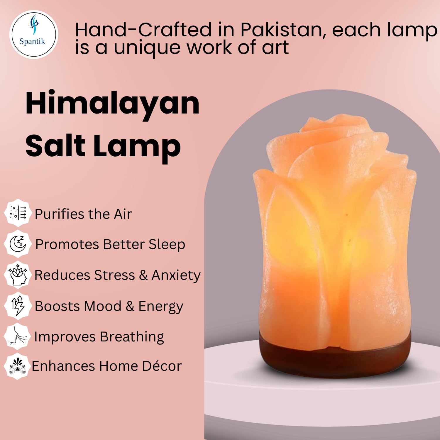 Spantik office desk lamp adds subtle warmth to workspace.