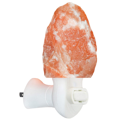 Spantik salt lamp amber night light adds cozy mood to living room.