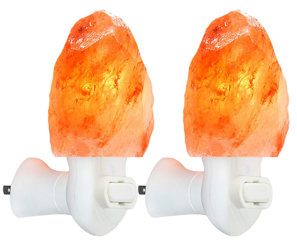 Spantik pink Himalayan salt lamp hand carved glows warm, enhancing bedroom ambiance.