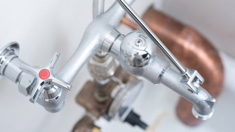 Speakman through-wall installation with 8-inch centers and adjustable wall flanges