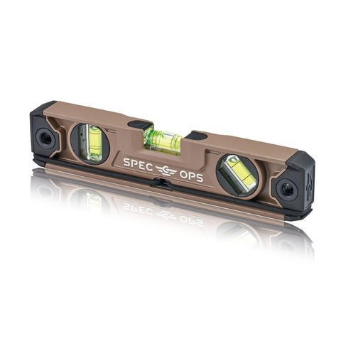 Spec Ops torpedo level with magnetic base grips metal surfaces for hands-free leveling.