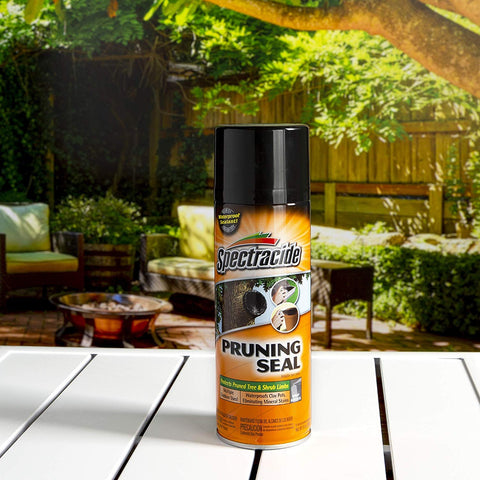 Spectracide Pruning Seal on mower deck underside protects against debris buildup.