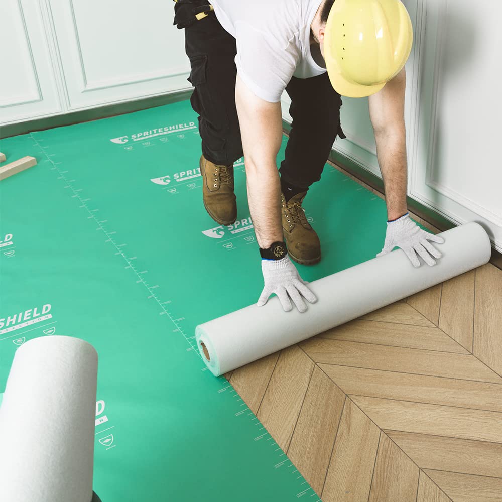 Spriteshield H-300G roll shown during installation protecting floors with durable film