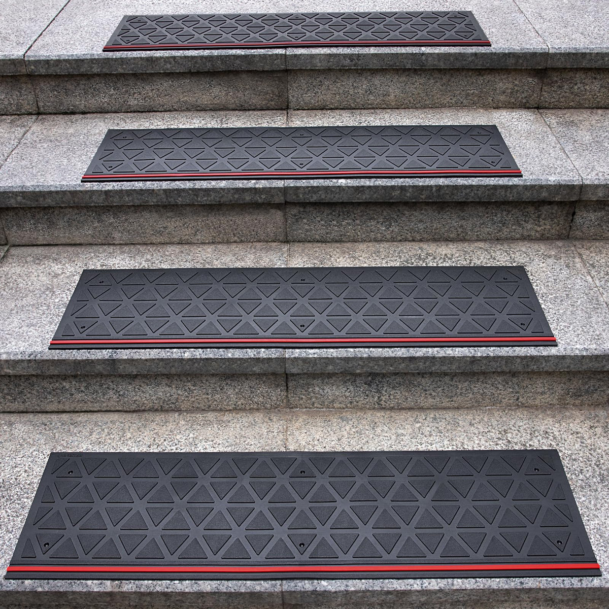 Spurtar rubber stair tread on wooden stairs showing anti-slip grip for outdoor safety.
