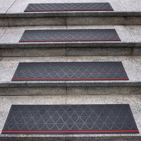 Spurtar rubber stair tread on wooden stairs showing anti-slip grip for outdoor safety.