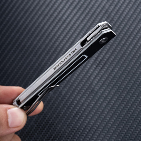 SRM folding knife black finish adds stealth style.