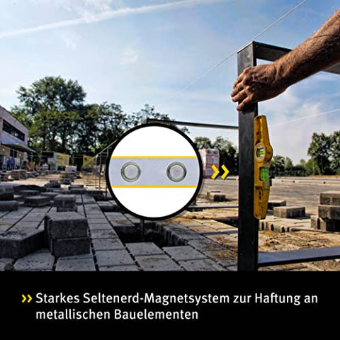 Magnetic base grips metal for precise overhead measurements.