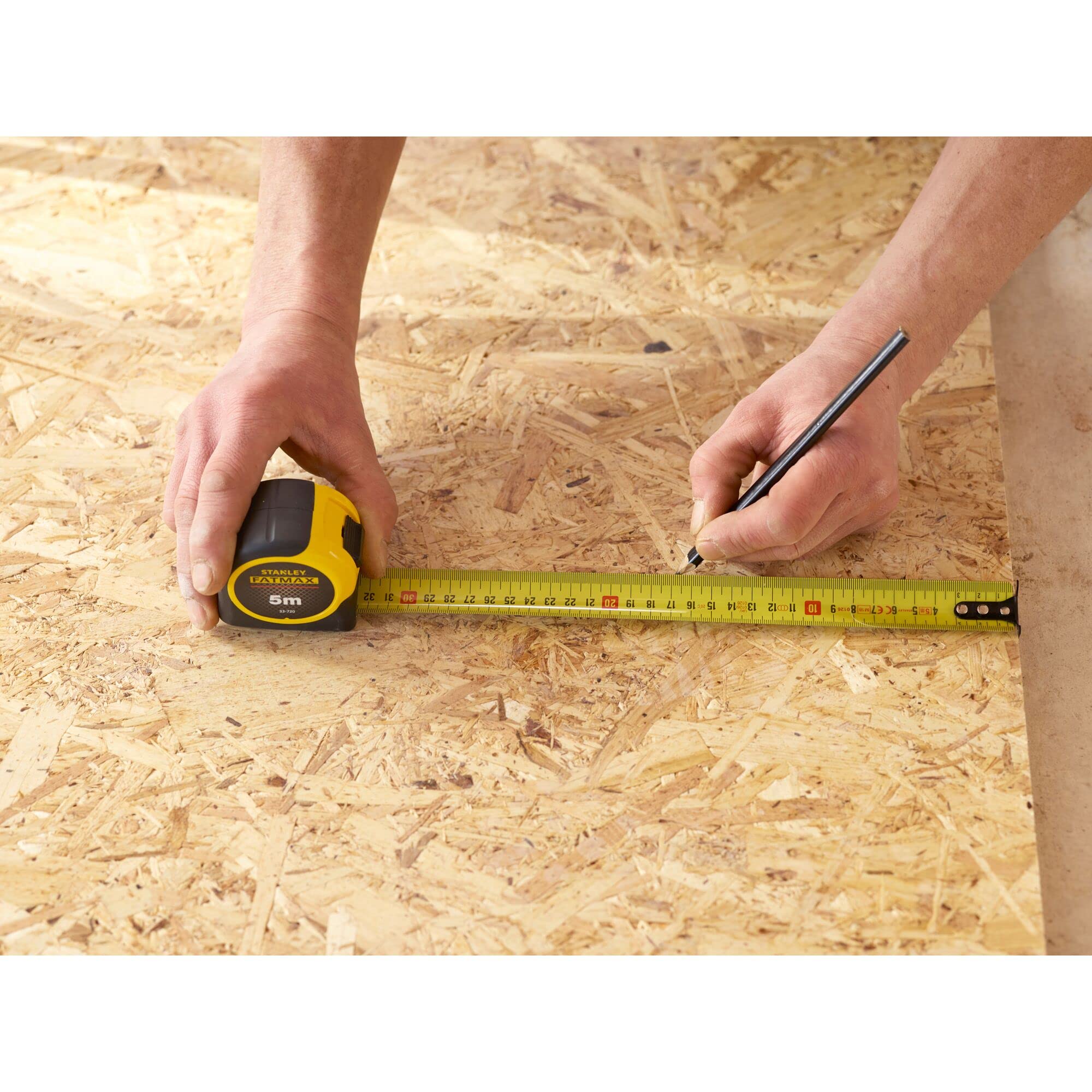 Stanley FatMax magnetic hook end attached to metal edge.