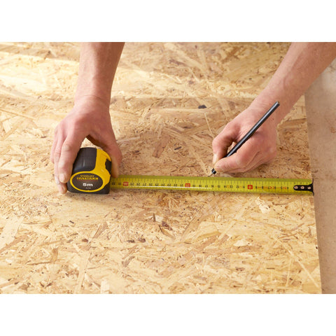 Stanley FatMax magnetic hook end attached to metal edge.