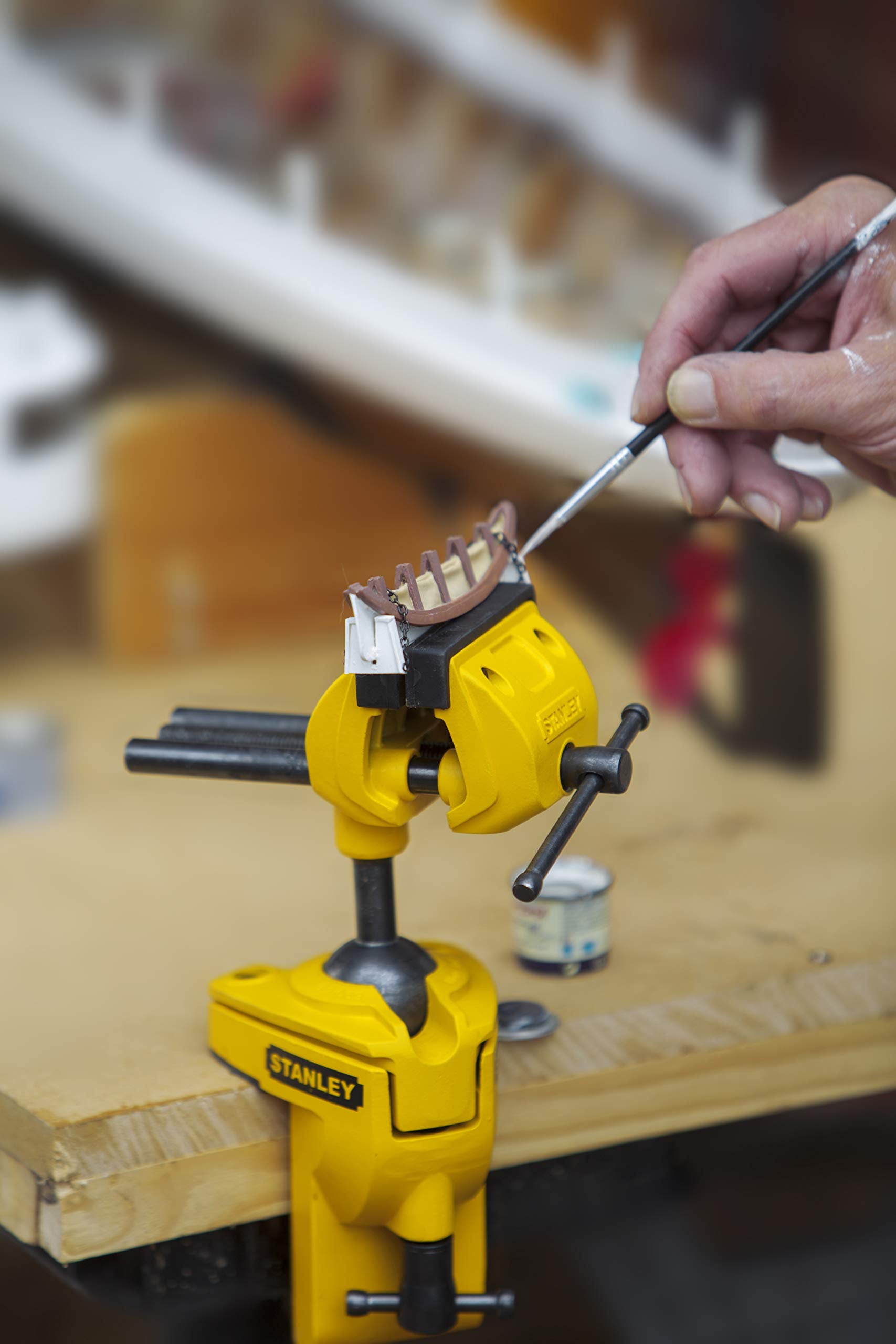 Easy-angle lock maintains chosen position during tasks.