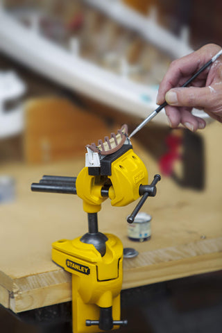 Easy-angle lock maintains chosen position during tasks.