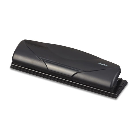 Staples Mini 3-Hole Punch showing aligned holes for neat binding