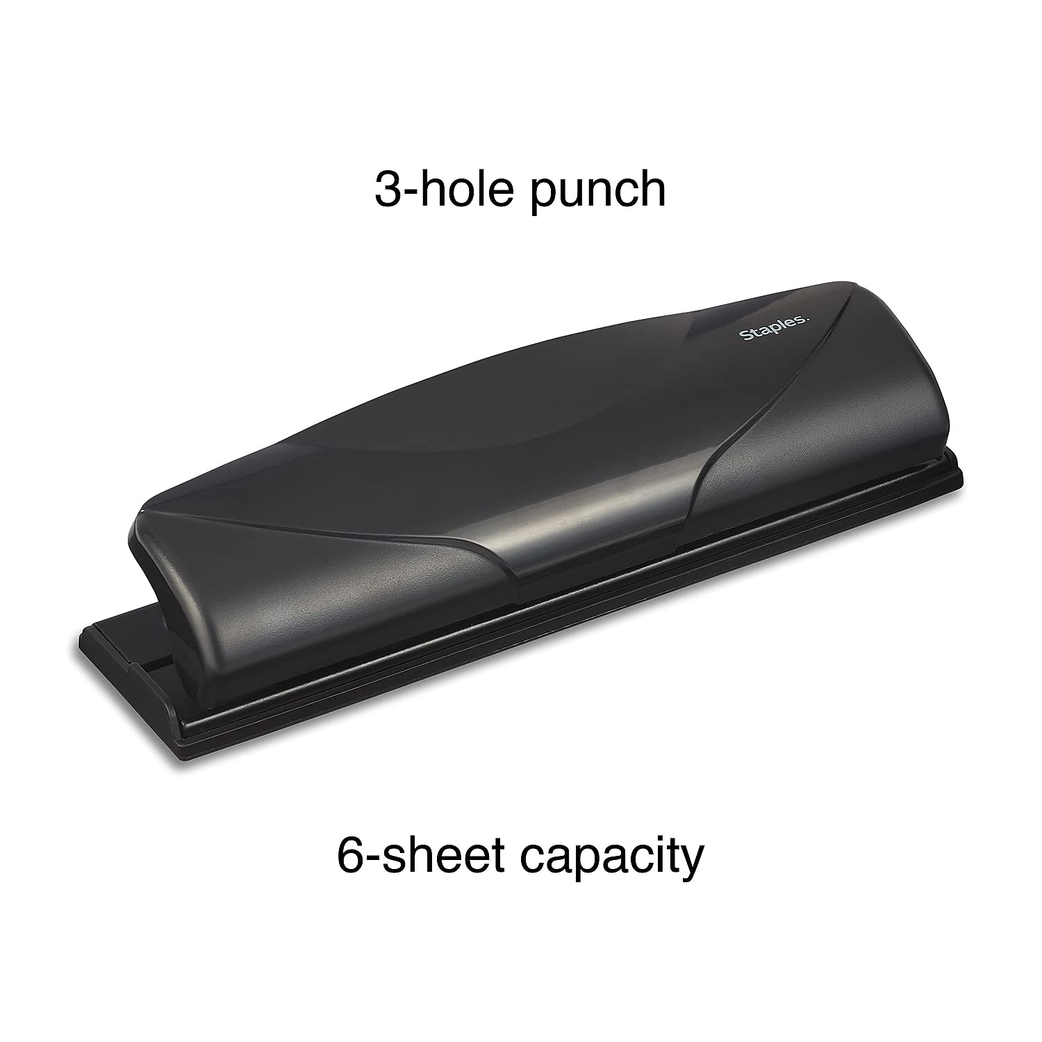 Staples Mini 3-Hole Punch on desk ready for quick binding