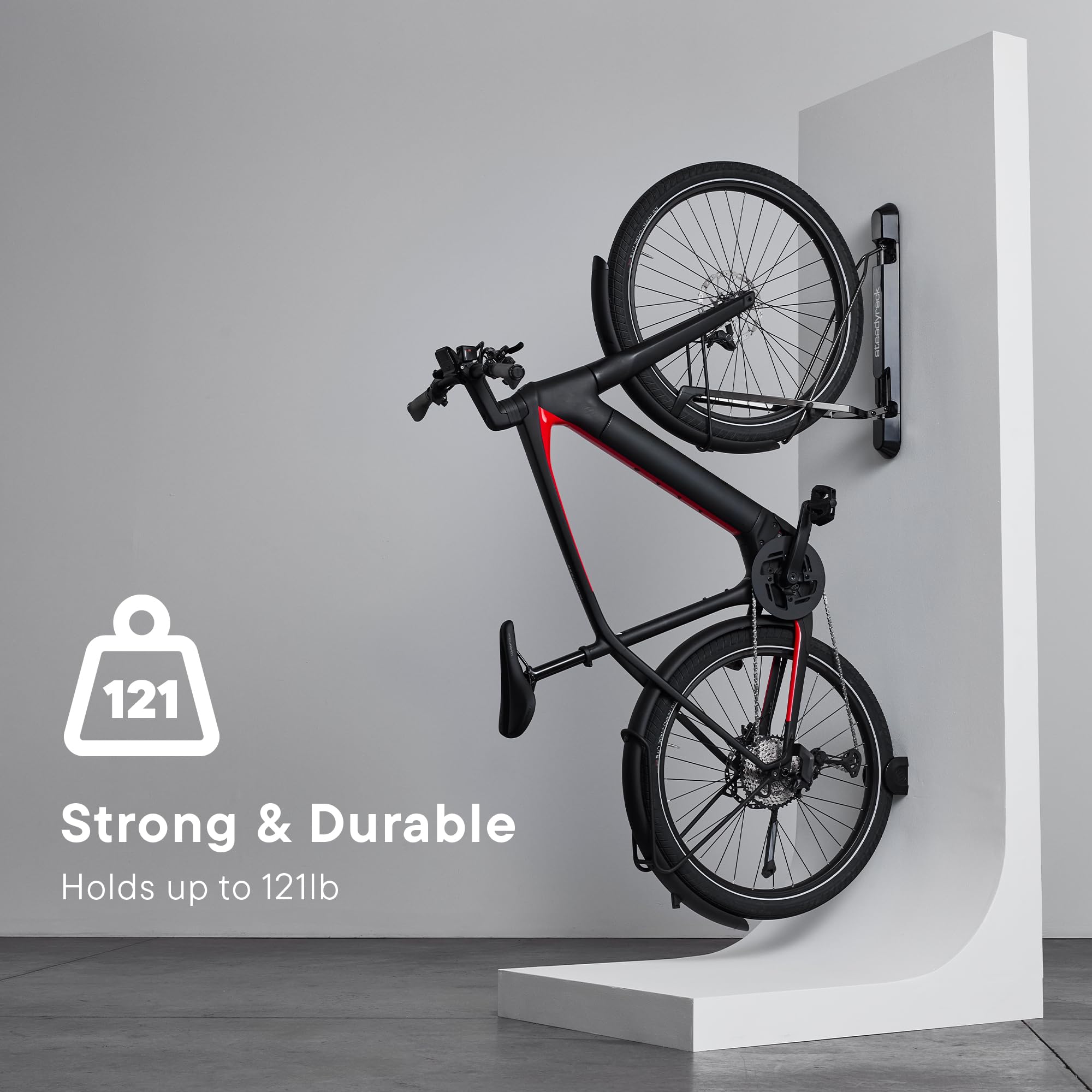 Roll-in bicycle being placed into ProFlex for easy storage.