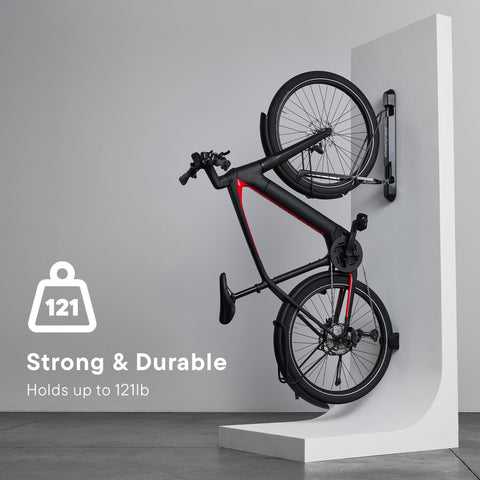 Roll-in bicycle being placed into ProFlex for easy storage.