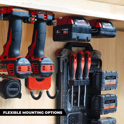 Mounted under a shelf with Milwaukee M18 batteries ready for quick access.