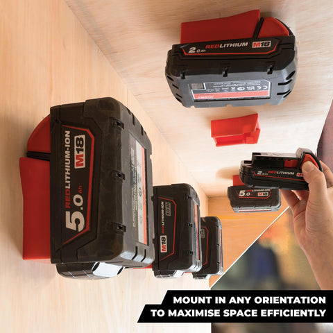 Close-up of StealthMounts red M18 holder showing secure click-and-lock action.
