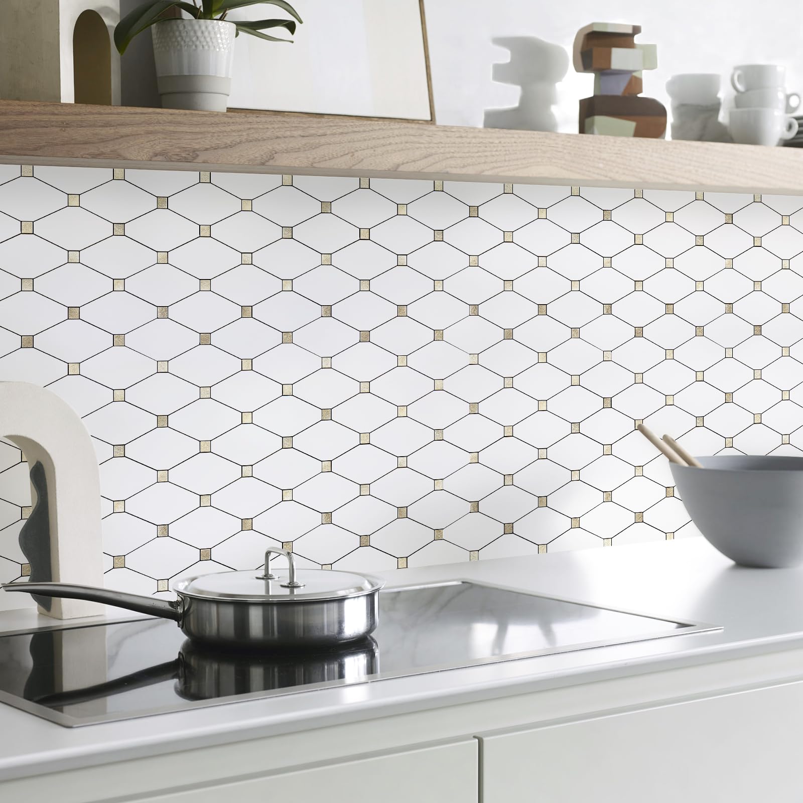 STICKGOO mixed metal gold accents add sparkle under lighting on the backsplash.