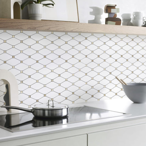 STICKGOO mixed metal gold accents add sparkle under lighting on the backsplash.