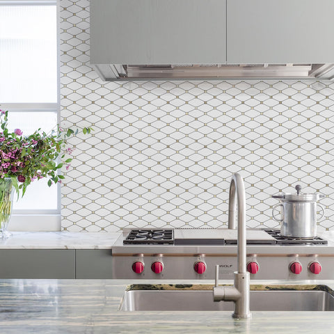 STICKGOO peel and stick installation simplifies a DIY kitchen upgrade.