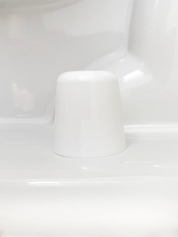 Stinky John's Tall Bolt Caps shown in a bathroom remodel for a neat look