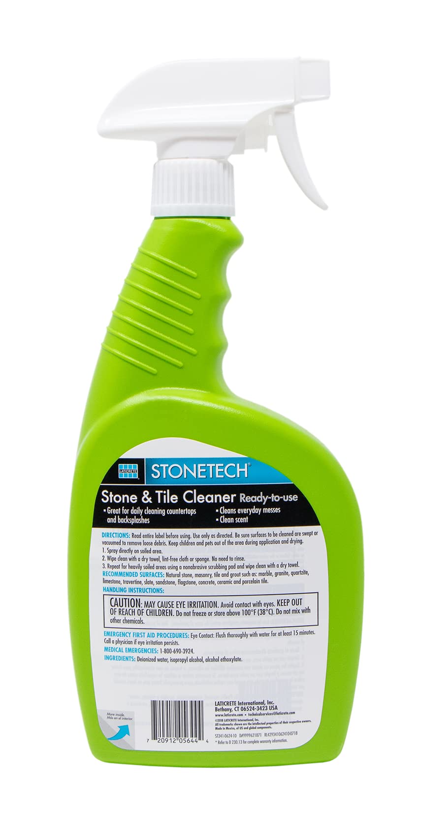StoneTech spray bottle applying cleaner to backsplash for maintenance.