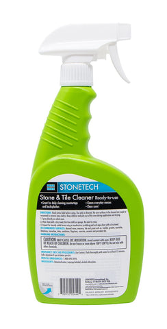 StoneTech spray bottle applying cleaner to backsplash for maintenance.