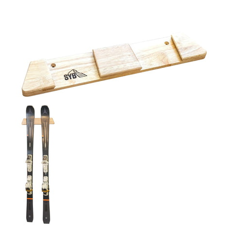 Cabin wall display featuring StoreYourBoard ski rack for versatile storage of ski types.