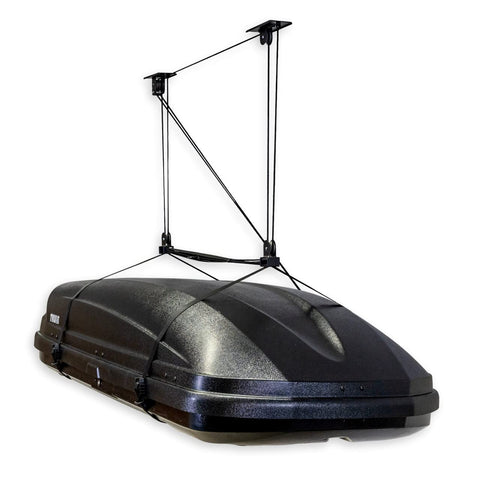 StoreYourBoard cargo box pulley system overhead lift keeps garage floor clear.