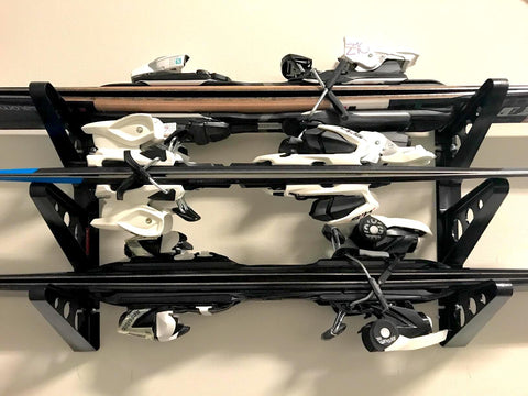 StoreYourBoard adjustable wall rack installs quickly for a clean garage storage system.