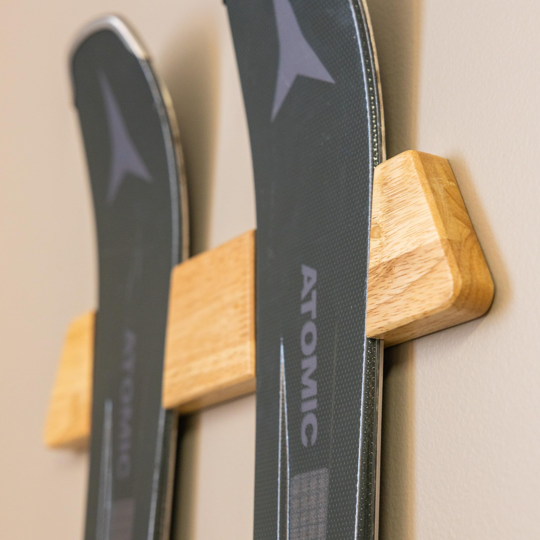 StoreYourBoard horizontal wood ski rack wall mount provides a clean, space-saving ski display.