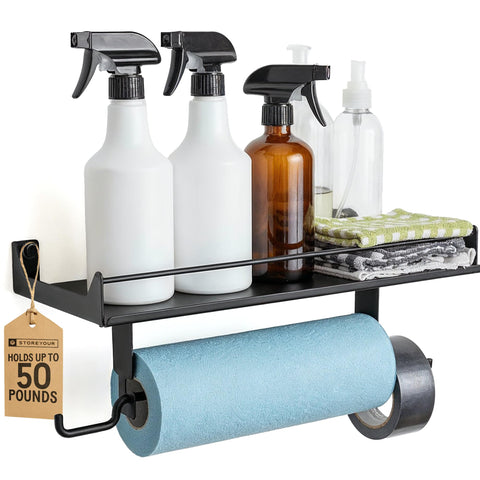 StoreYourBoard wall-mount paper towel holder with towels ready for use in a garage.
