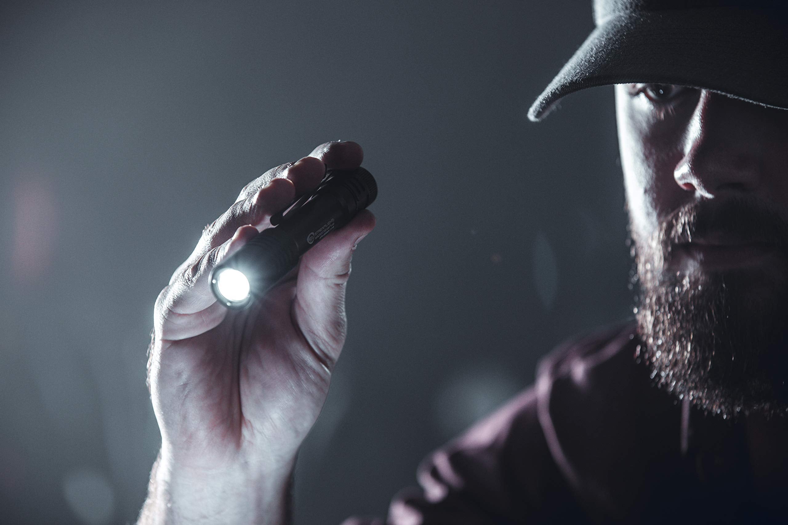 Push-tail switch offering momentary and constant-on lighting