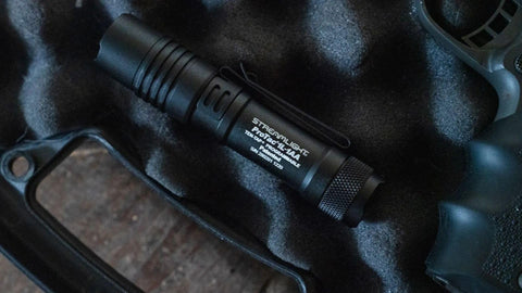 Streamlight ProTac 1L-1AA compact with clip enables quick access.