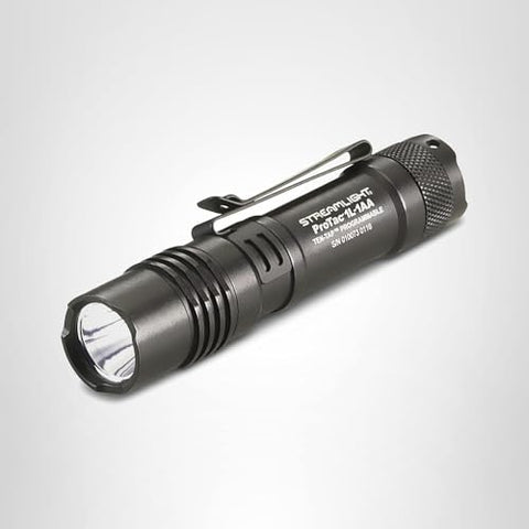 Streamlight ProTac 1L-1AA holster included for secure carry.