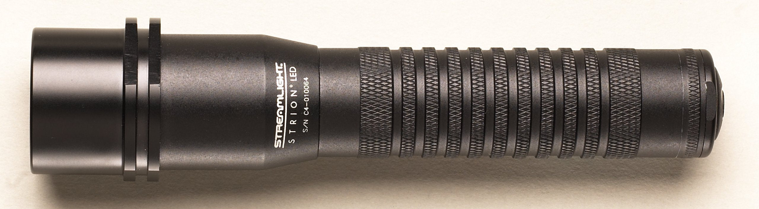 Streamlight Strion beam image highlights 219-meter reach for long-range tasks.