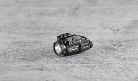 Streamlight TLR-7 X rail clamp for tool-free mounting.