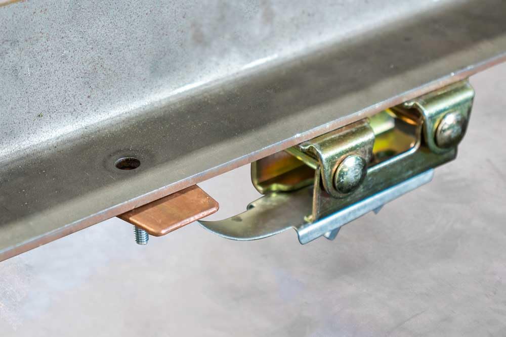 Strong Hand Tools pivoting V-pad base aligns curved steel panels for easy mounting.