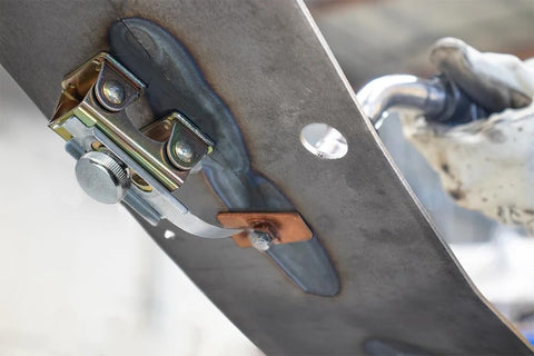 Strong Hand Tools spring-loaded arm lets you place and weld quickly.