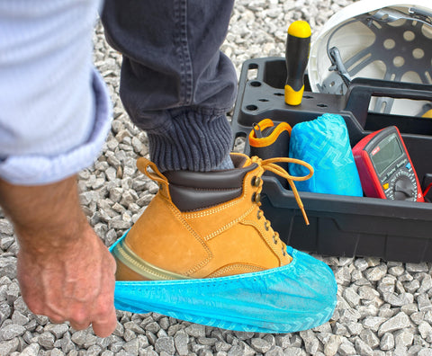 Strongman Tools non-slip shoe covers provide secure footing for indoor and outdoor projects.
