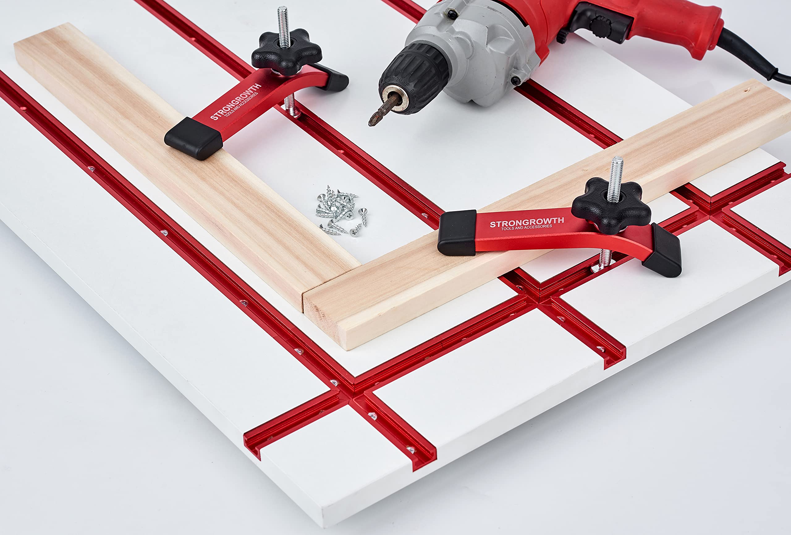 Red STRONGROWTH clamp kit with bolts, washers, and knobs for mounting