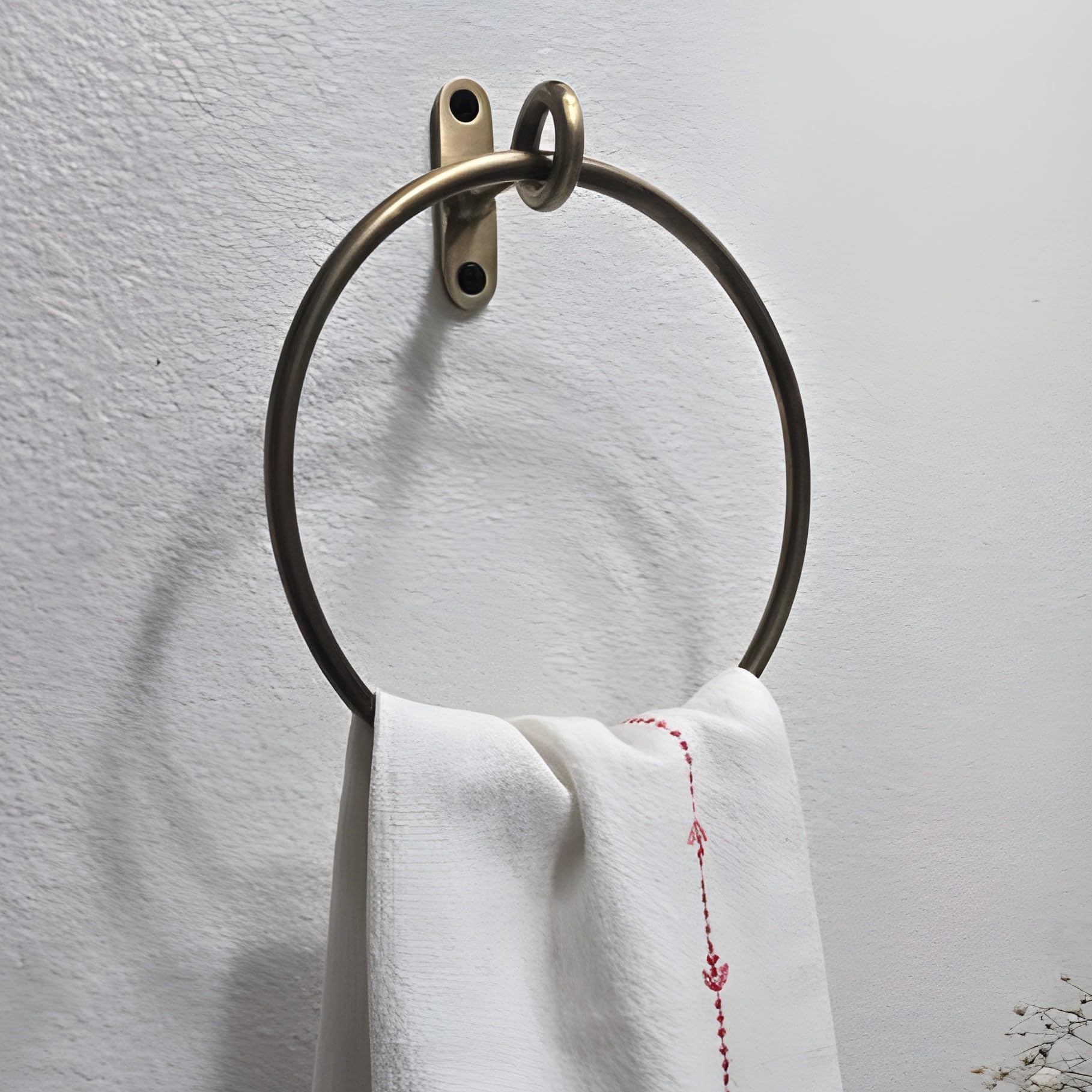 Stylentdecor antique brass round towel ring in bathroom for organized towels.