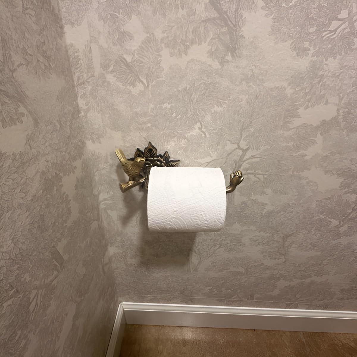 Stylentdecor brass bird toilet paper holder screws and hardware for installation.