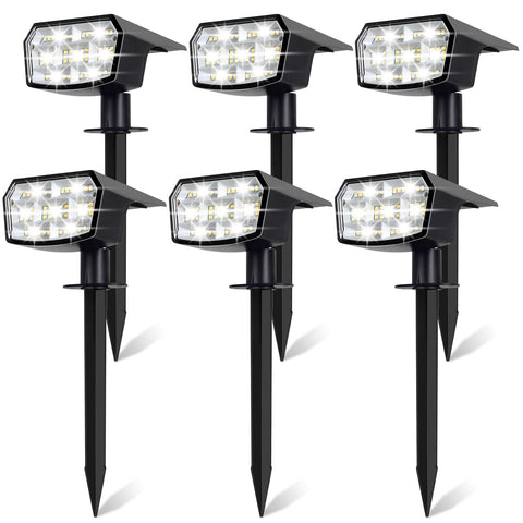 Sucolite 6-pack solar spot lights arranged along a garden path for outdoor illumination