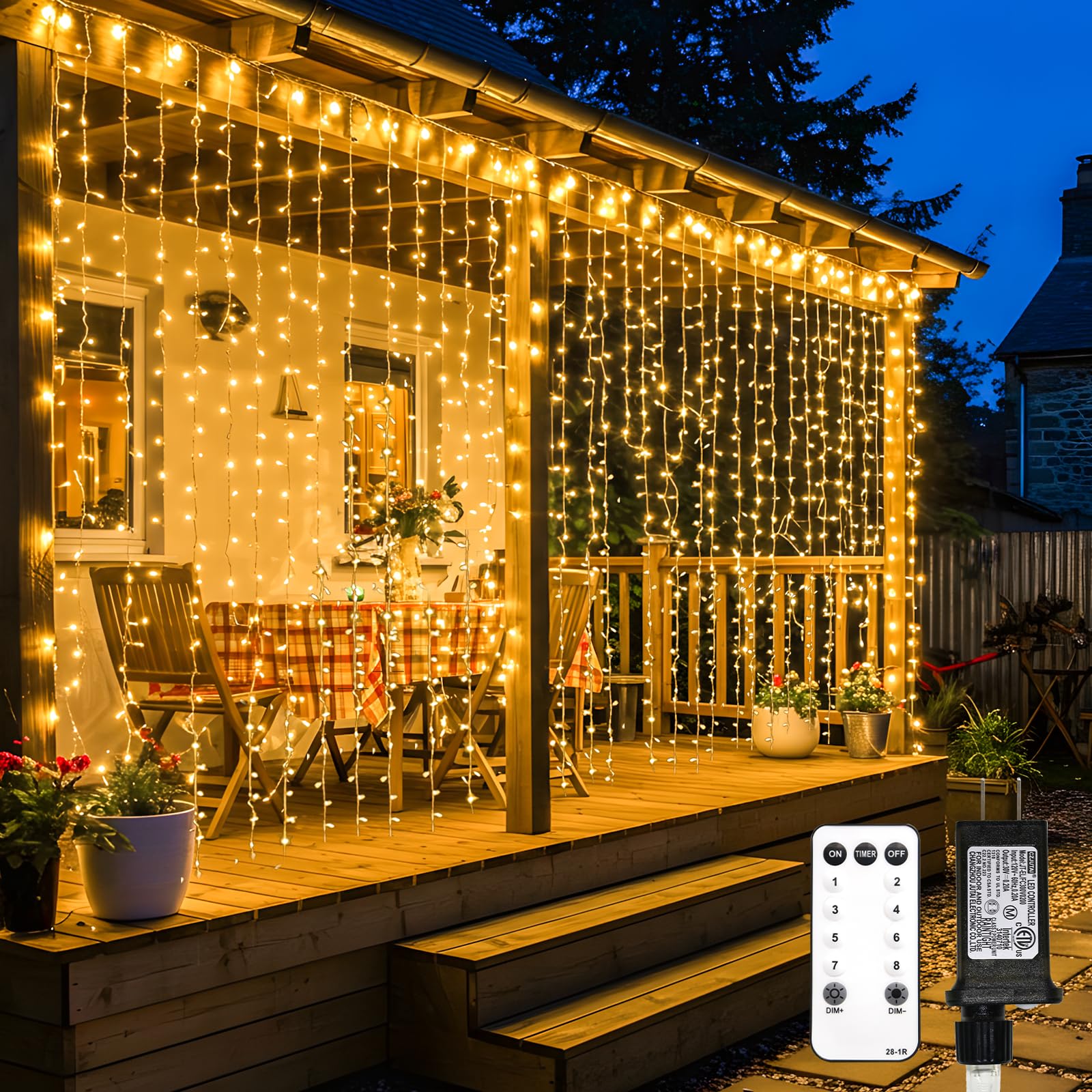 Suddus 600 LED curtain lights outdoors; warm white glow for festive windows.