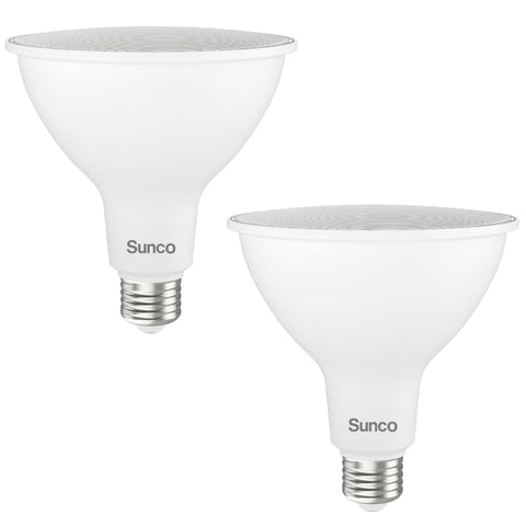 Sunco PAR38 outdoor flood light LED illuminating a yard at dusk.