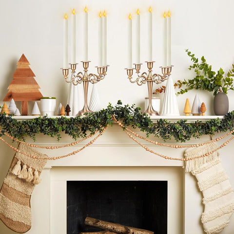 Sunjas ivory taper candles ideal for Christmas and weddings