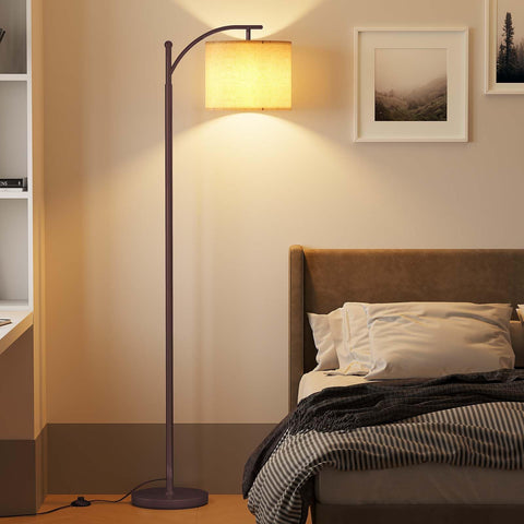 SUNMORY arc lamp enhances ambience in a cozy living room